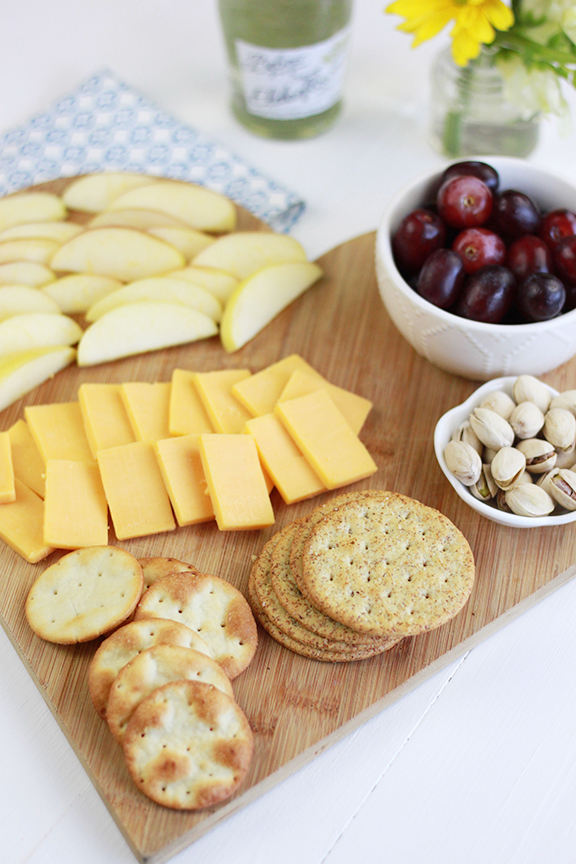 Quick and Easy Cheese Board! Perfect appetizer paired with wine for a fun girls night!