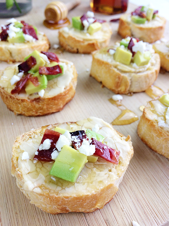 Avocado Bacon Crostini with Chili Infused Honey. Perfect appetizer for a dinner party!