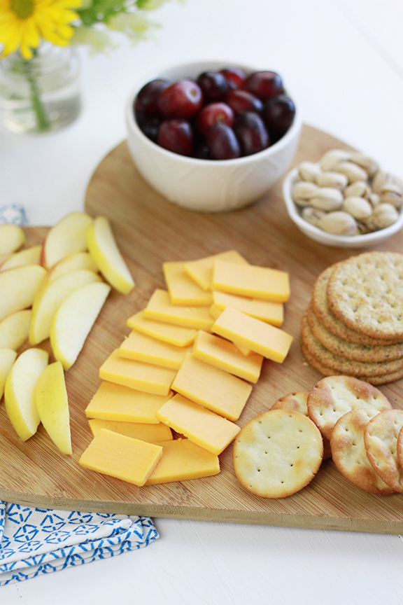 Quick and Easy Cheese Board! Perfect appetizer paired with wine for a fun girls night!