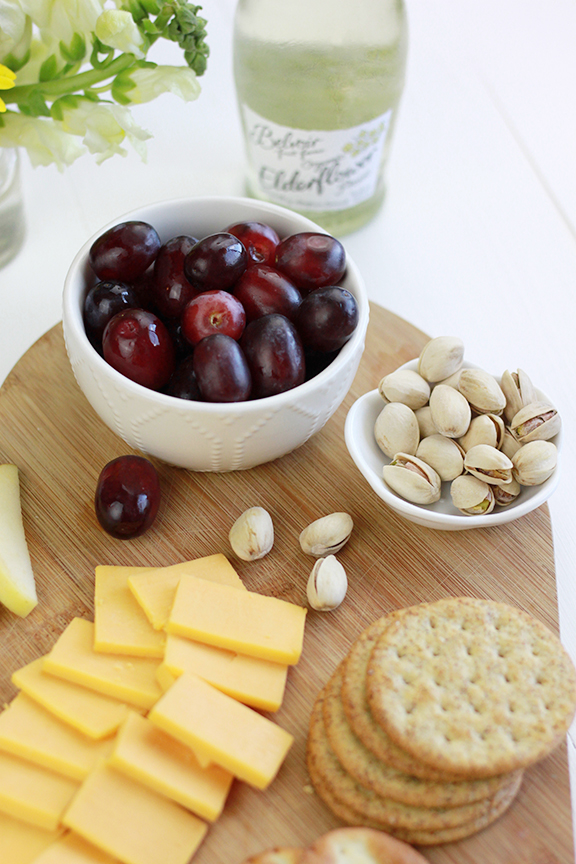 Quick and Easy Cheese Board! Perfect appetizer paired with wine for a fun girls night!
